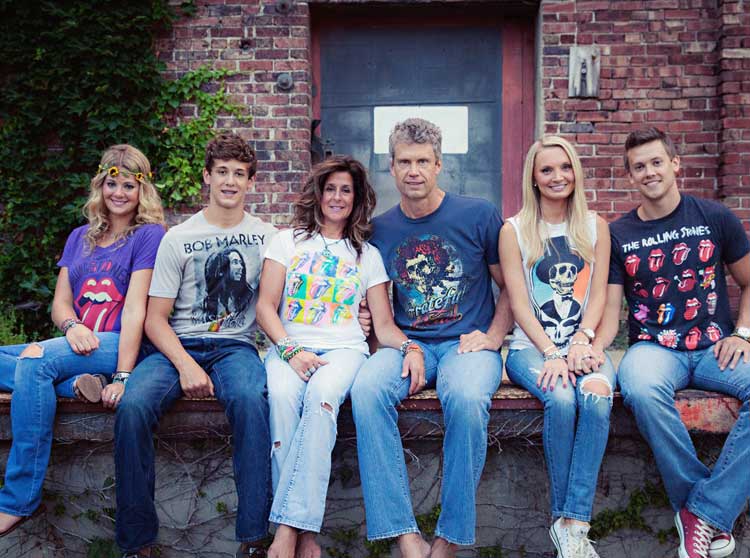 The Reid Family dressed up with 70s and 80s band shirts